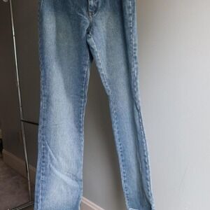 Vintage blue Zana Di jeans.‎ Light wash. Frayed finish on ends. Velvet bow belt